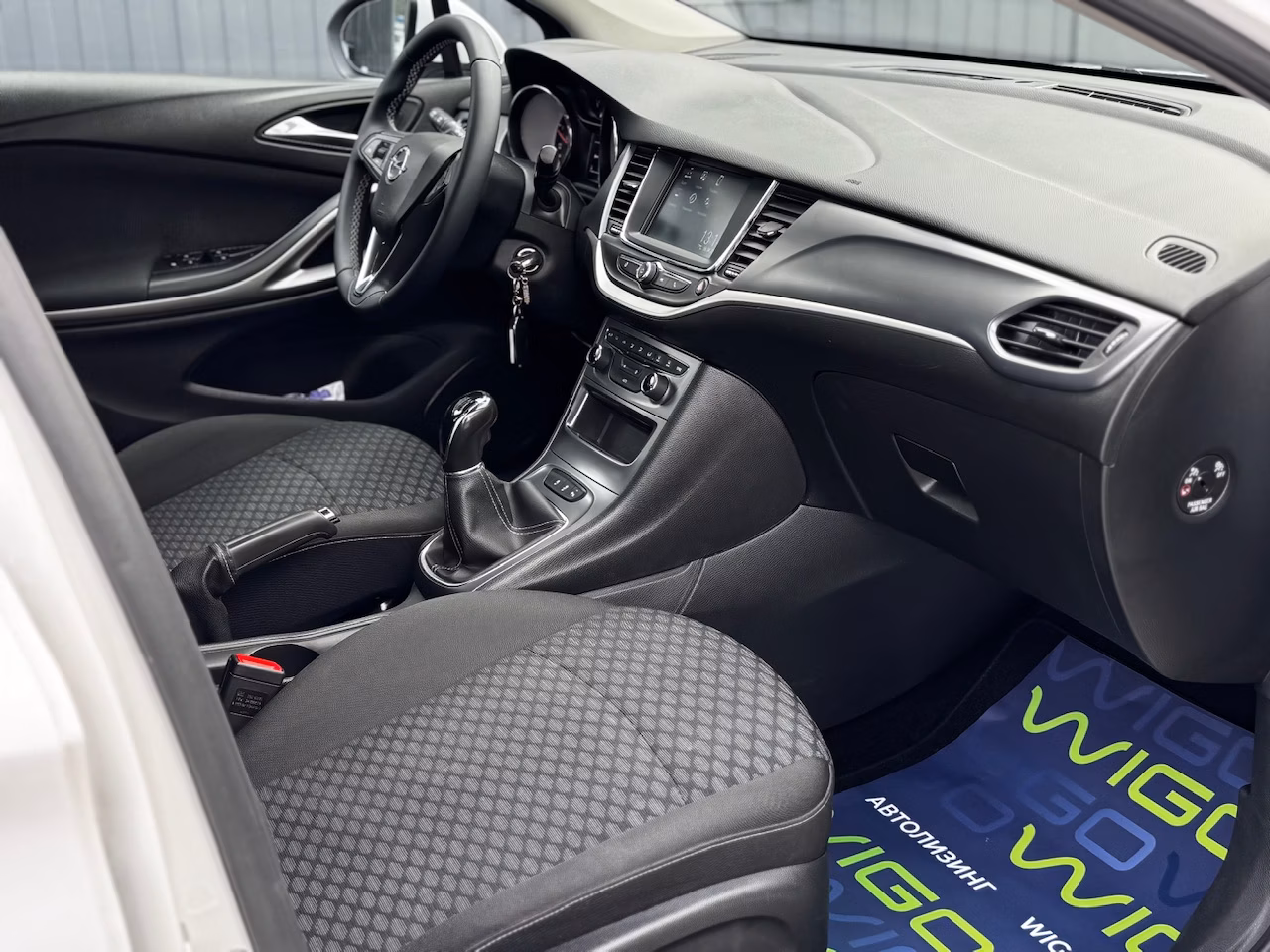 Opel Astra фото 11