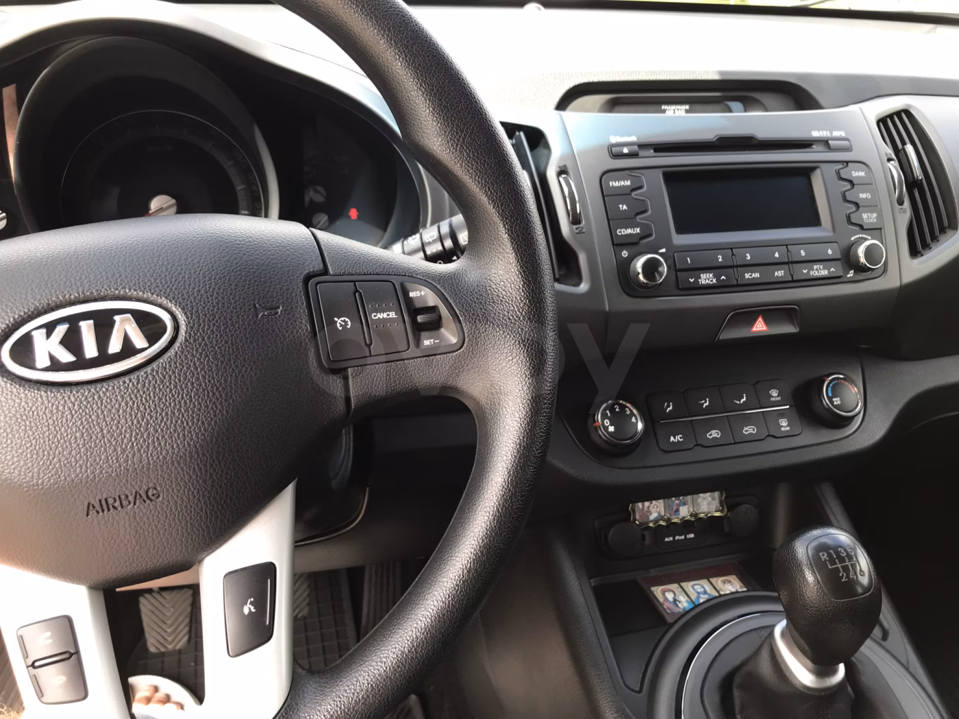 Kia Sportage фото 12