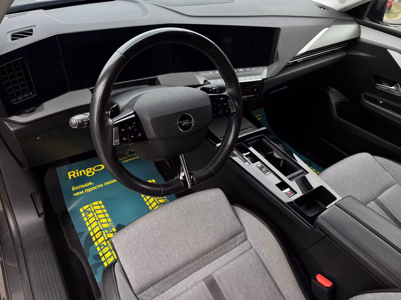 Opel Astra фото 9