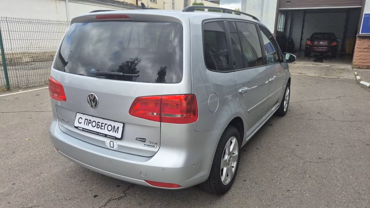 Volkswagen Touran фото 7