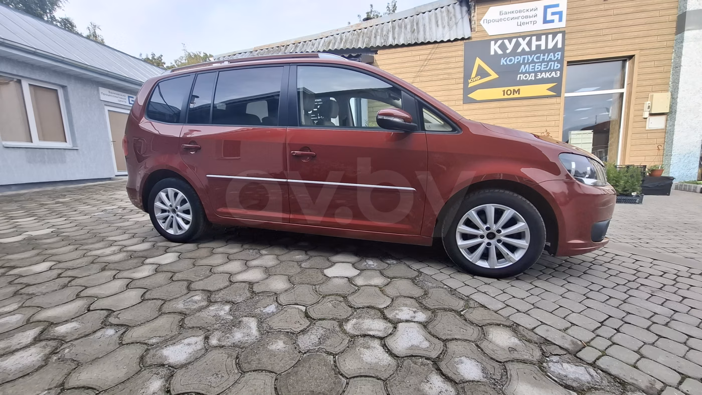 Volkswagen Touran фото 7
