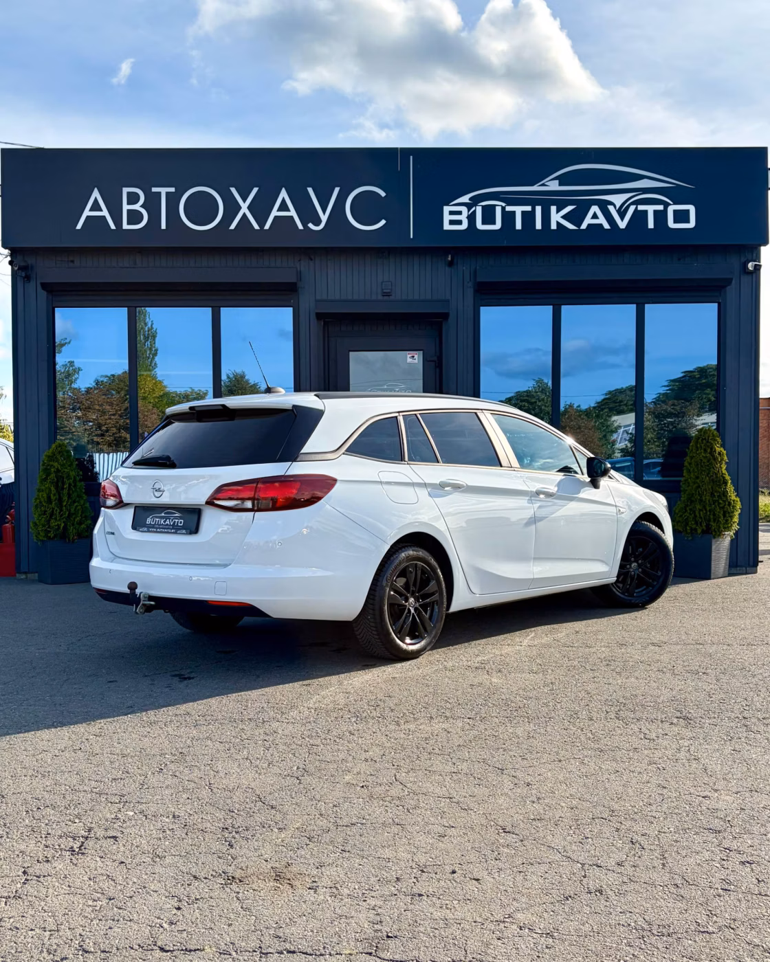 Opel Astra фото 7