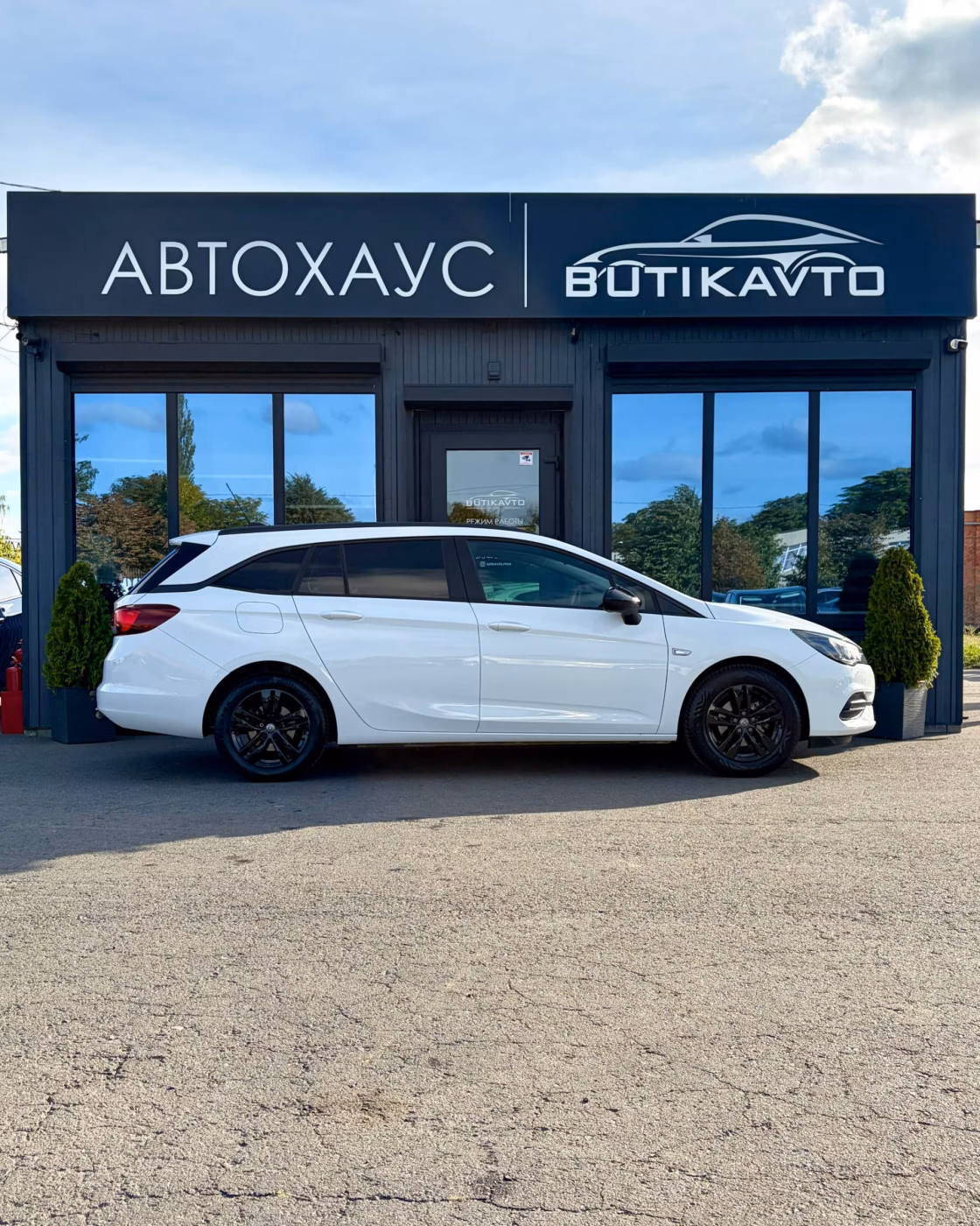 Opel Astra фото 8