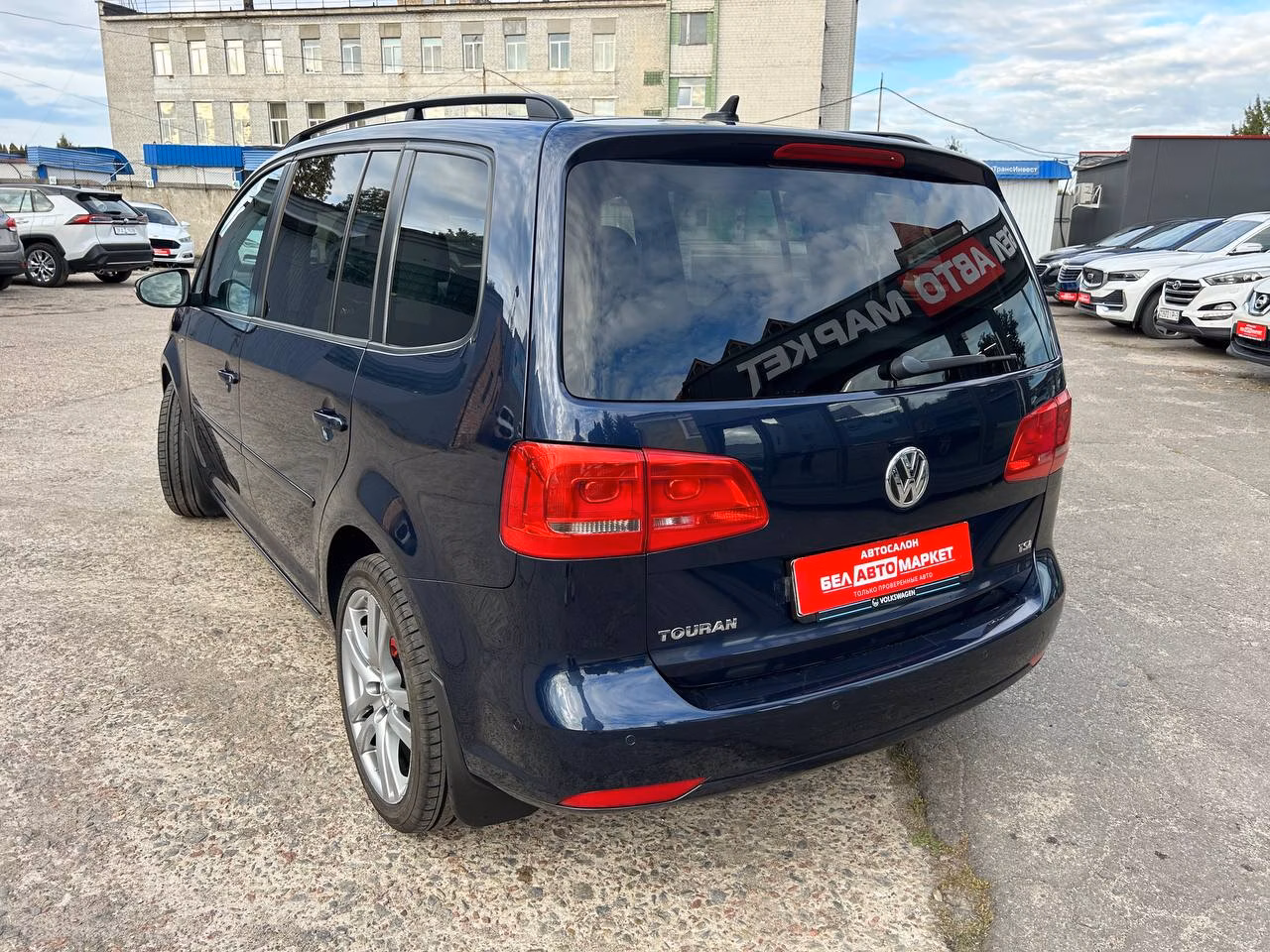 Volkswagen Touran фото 7