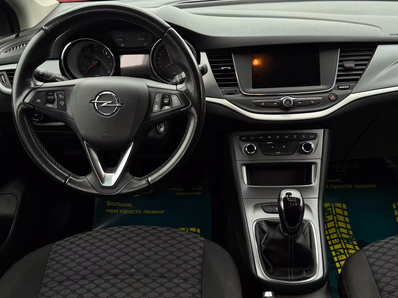 Opel Astra фото 11