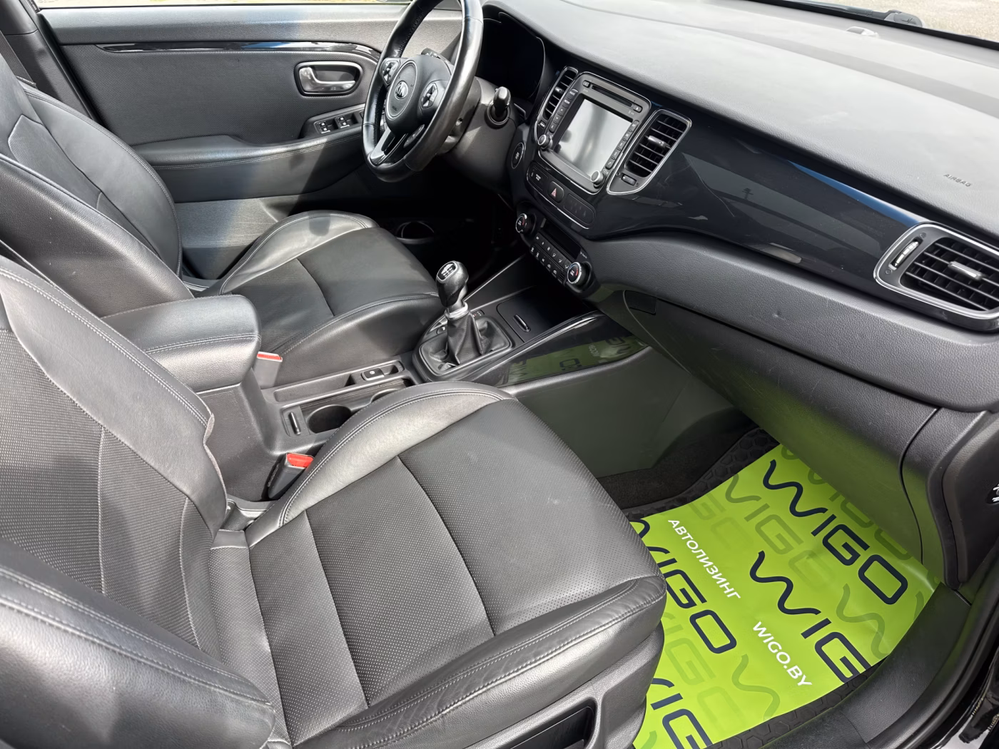 Kia Carens фото 12
