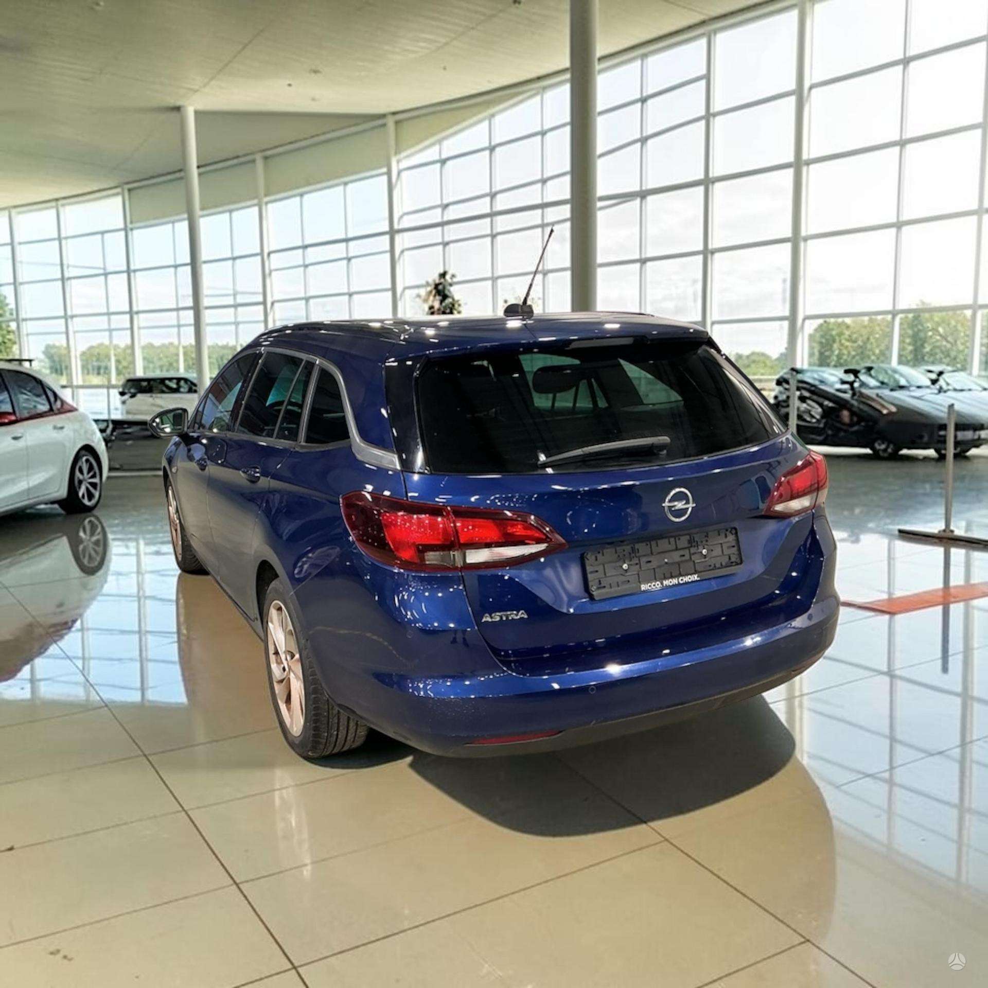 Opel Astra фото 3