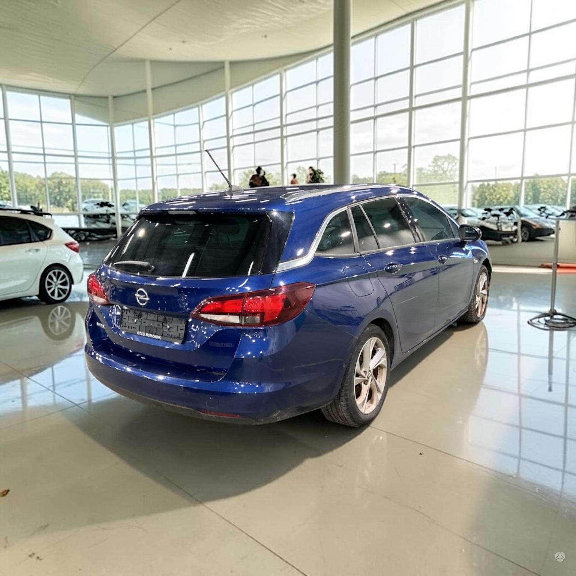 Opel Astra фото 4