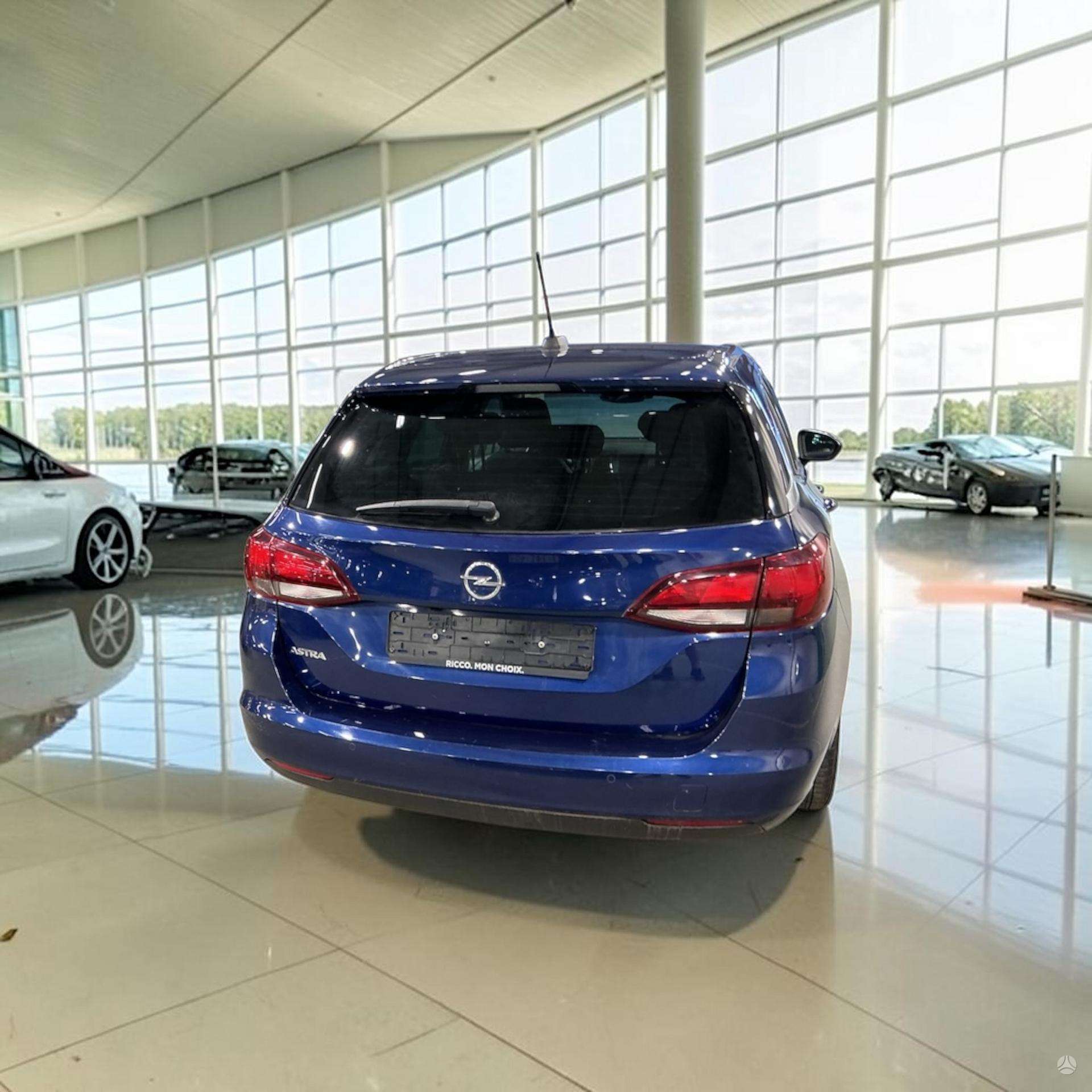 Opel Astra фото 5
