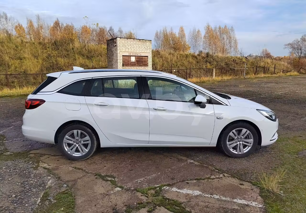 Opel Astra фото 7