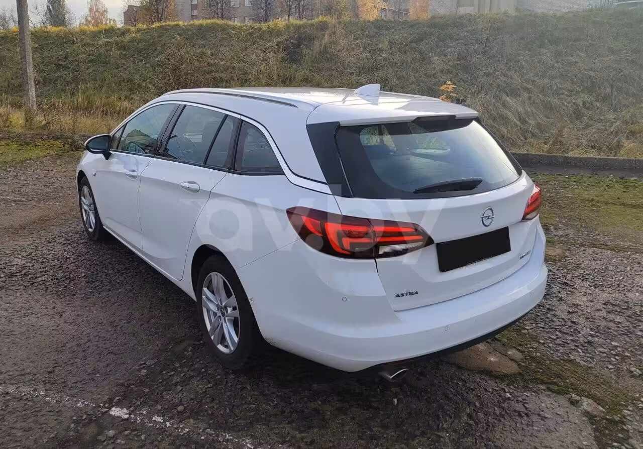 Opel Astra фото 5