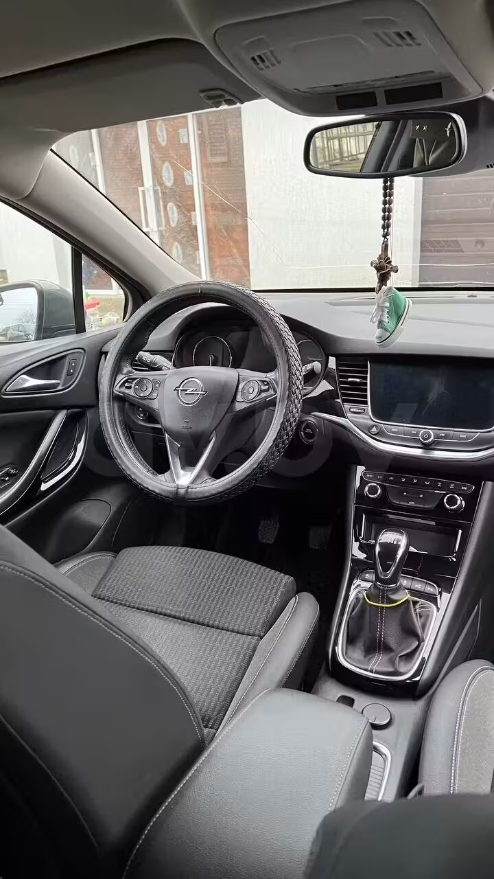 Opel Astra фото 7