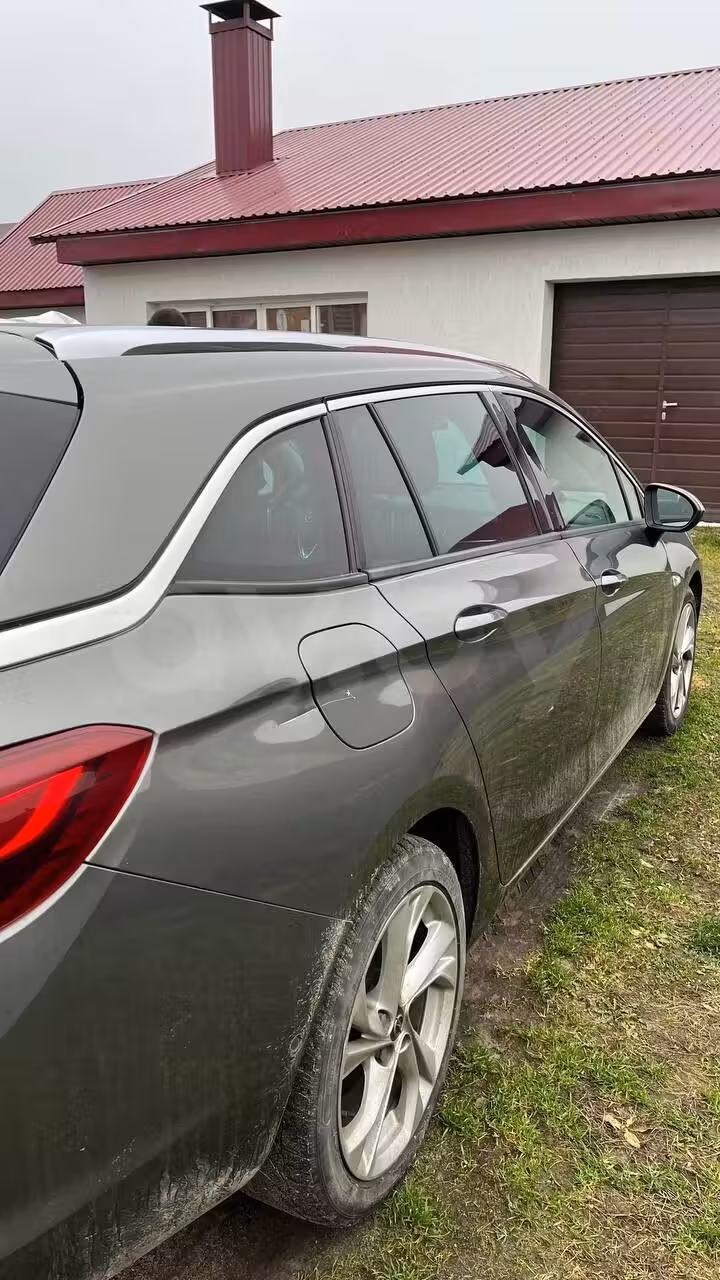 Opel Astra фото 8