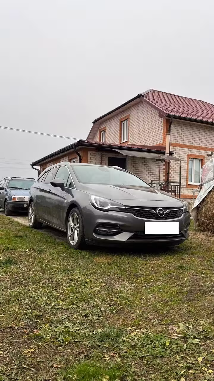 Opel Astra фото 5