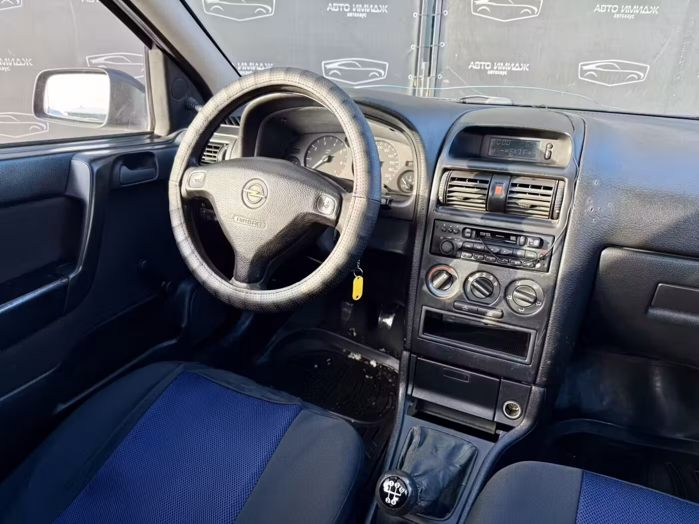 Opel Astra фото 9
