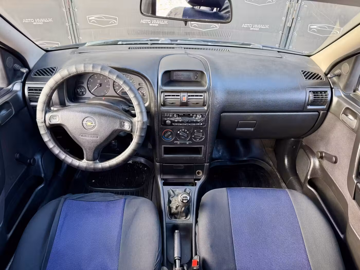 Opel Astra фото 13