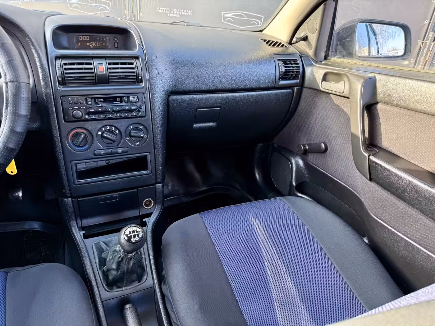 Opel Astra фото 11