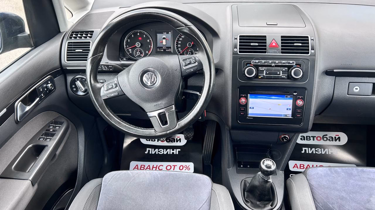 Volkswagen Touran фото 17