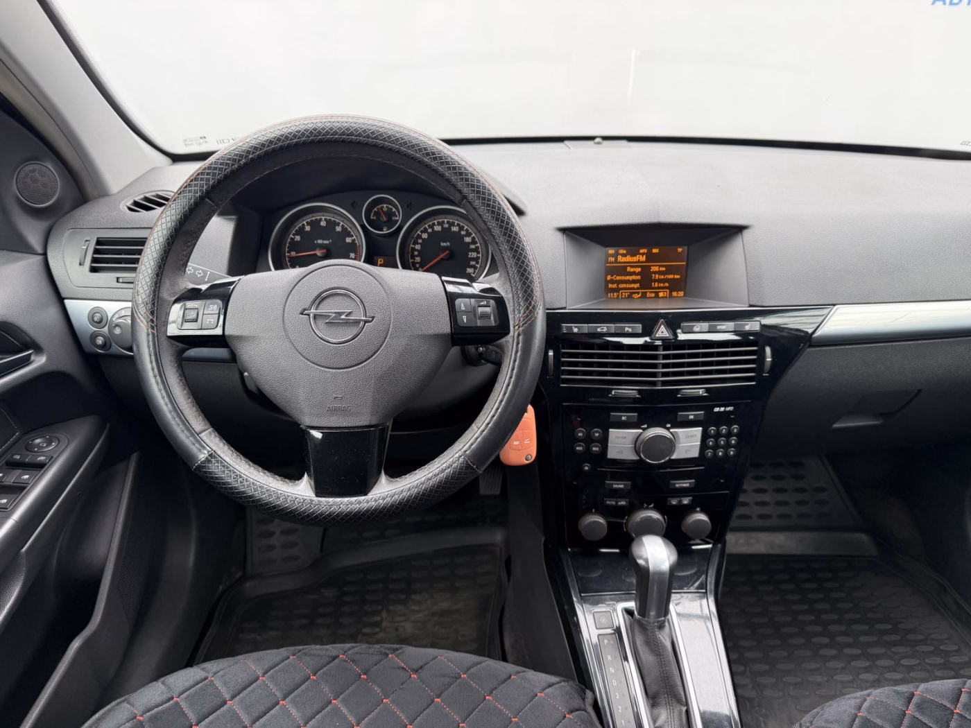 Opel Astra фото 12