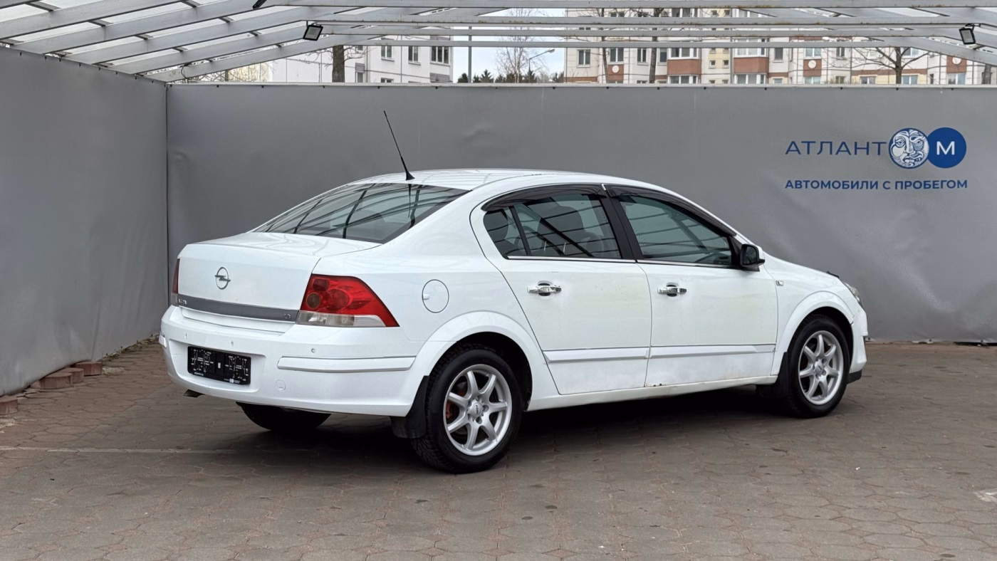 Opel Astra фото 6