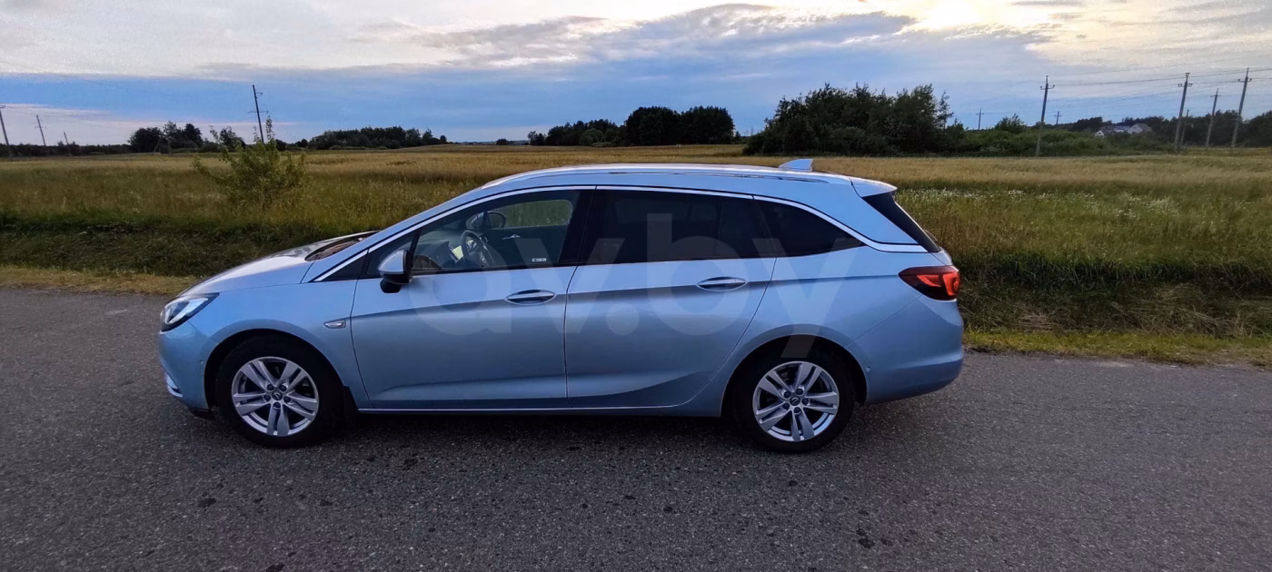 Opel Astra фото 19