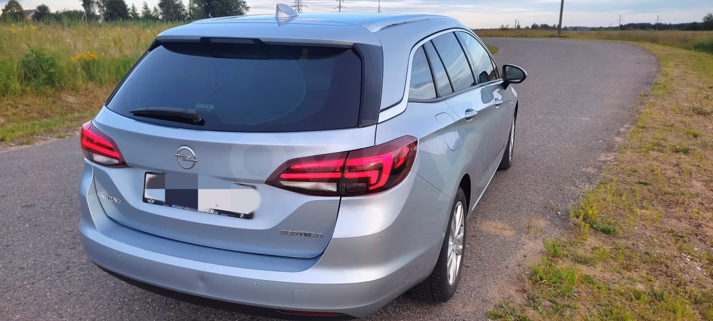 Opel Astra фото 5