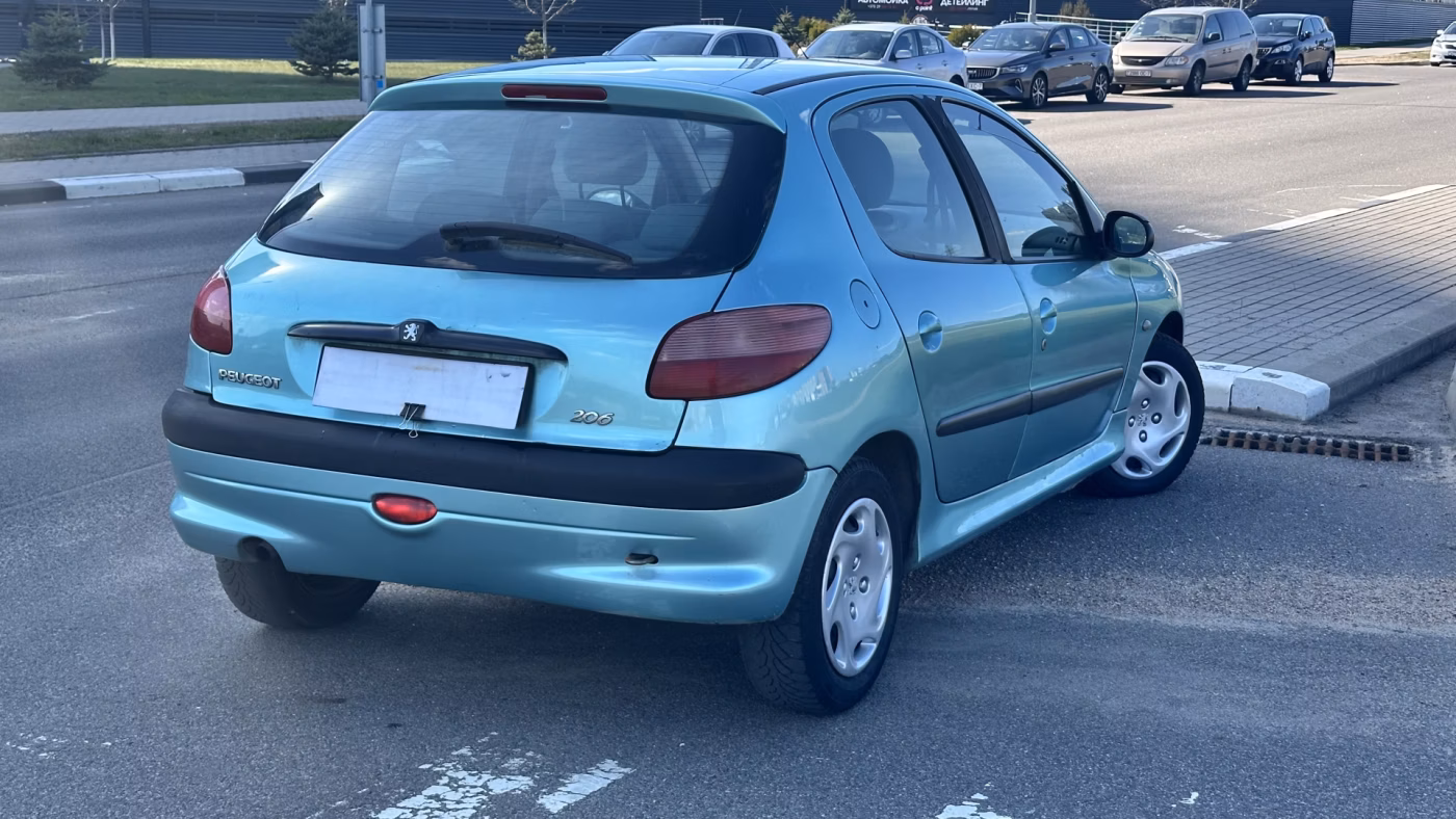 Peugeot 206 фото 11