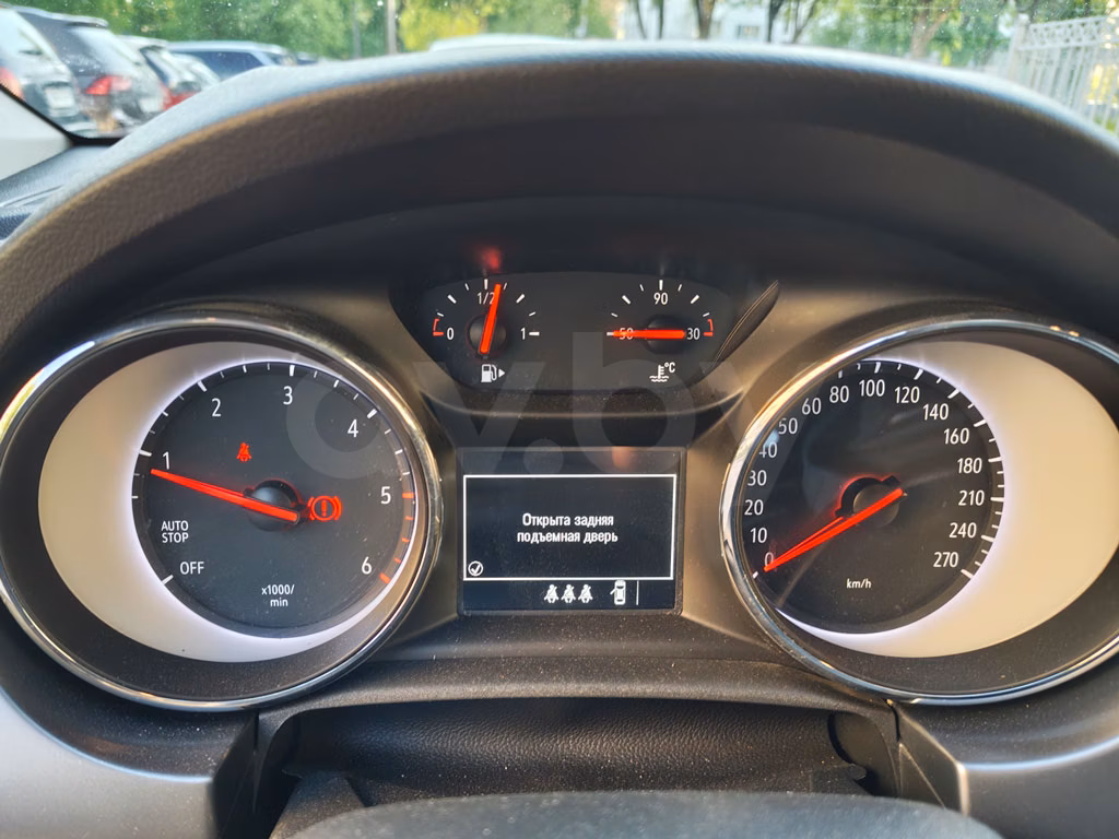Opel Astra фото 11