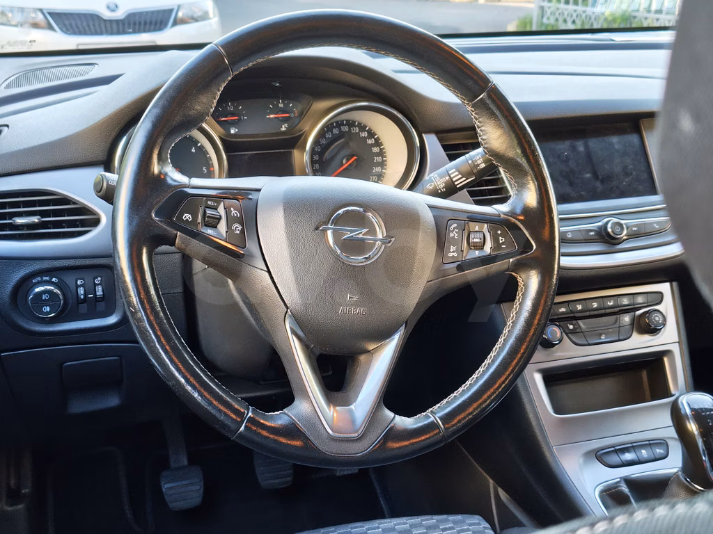 Opel Astra фото 14