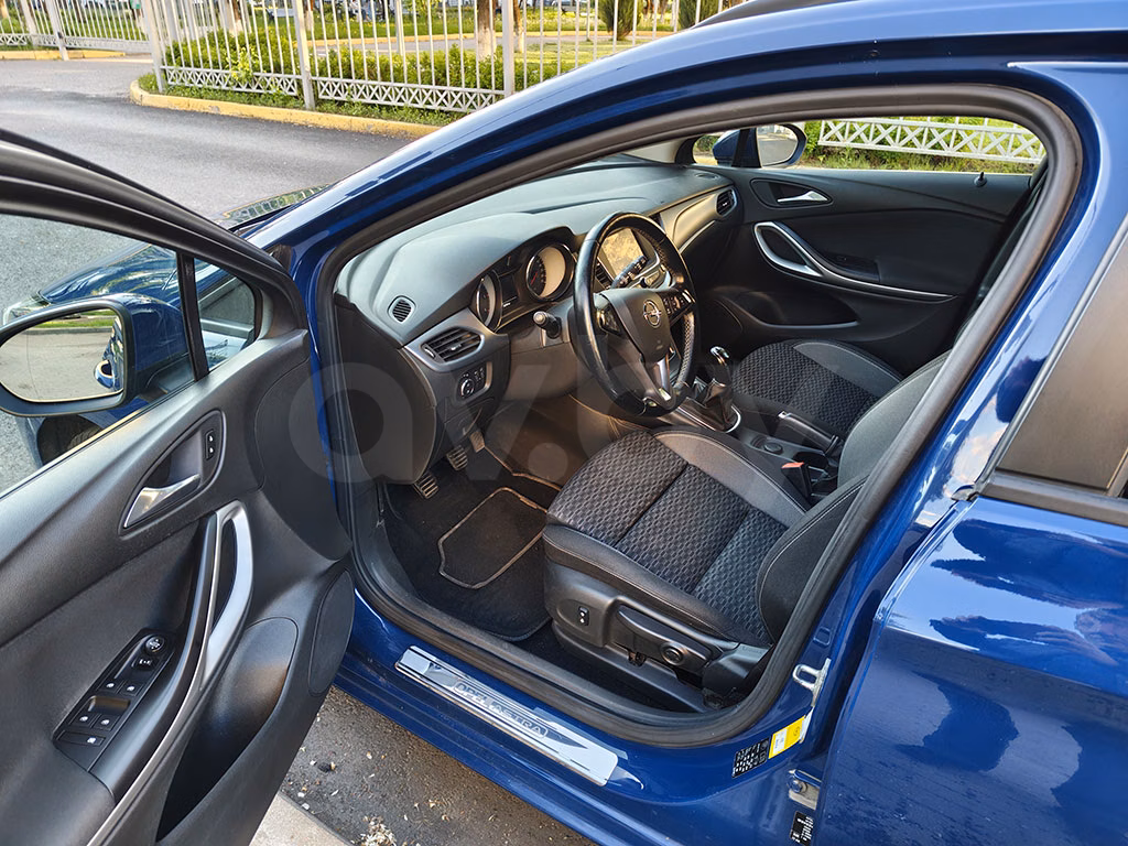 Opel Astra фото 7