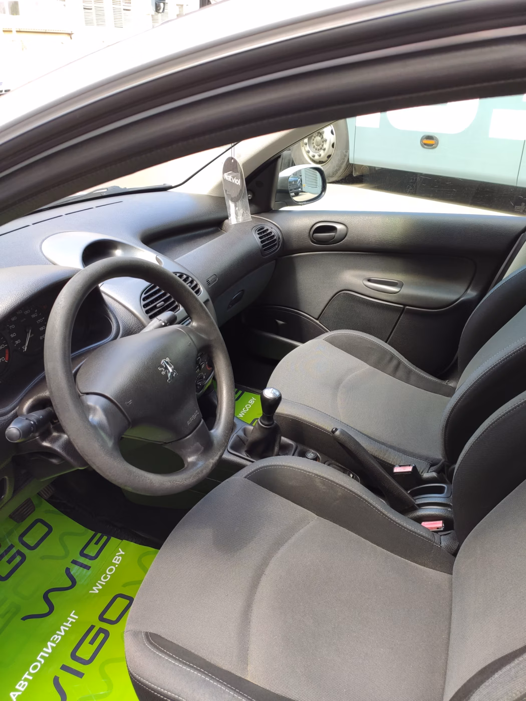 Peugeot 206 фото 13