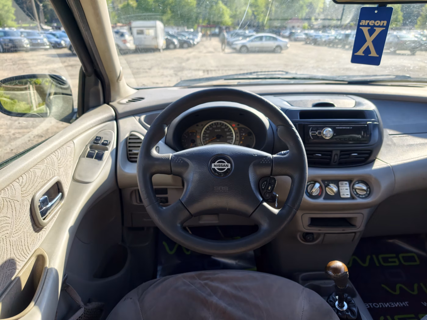 Nissan Almera Tino фото 14