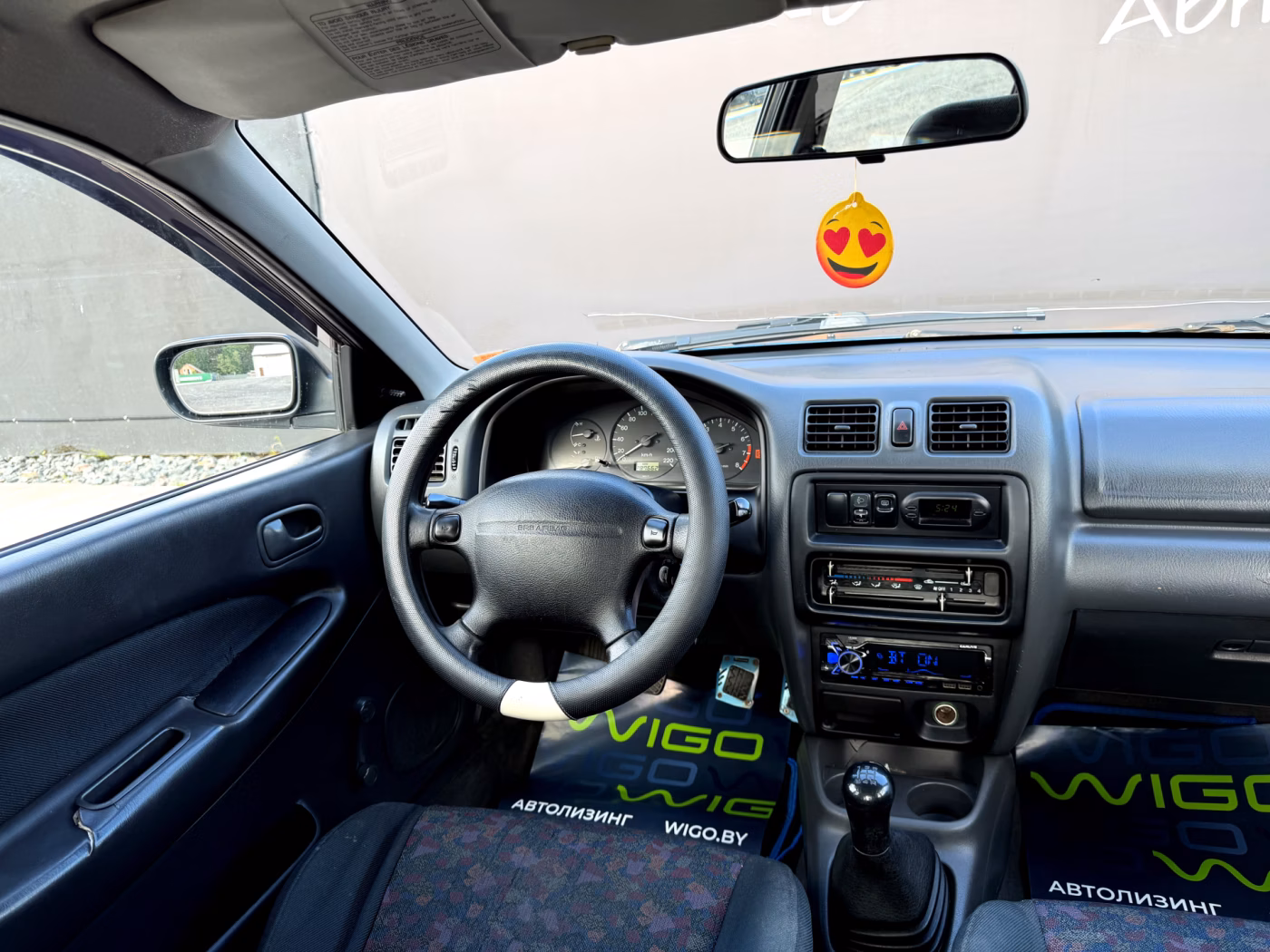 Mazda 323 фото 12