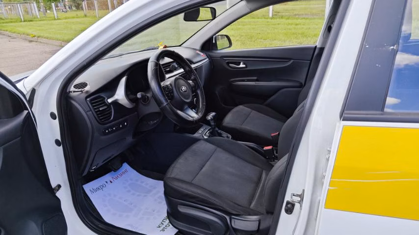 Kia Rio фото 12