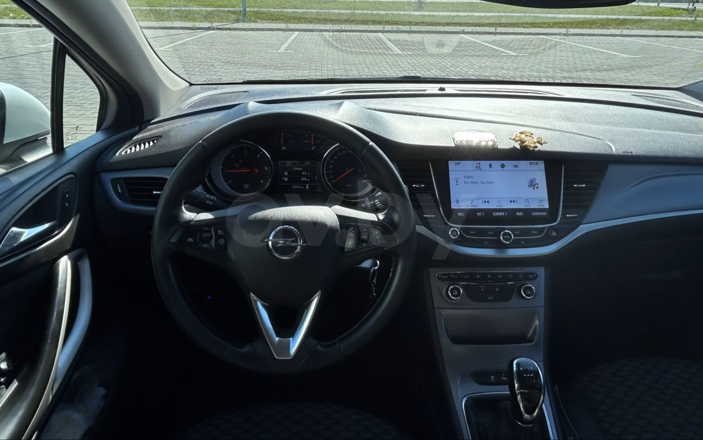 Opel Astra фото 8