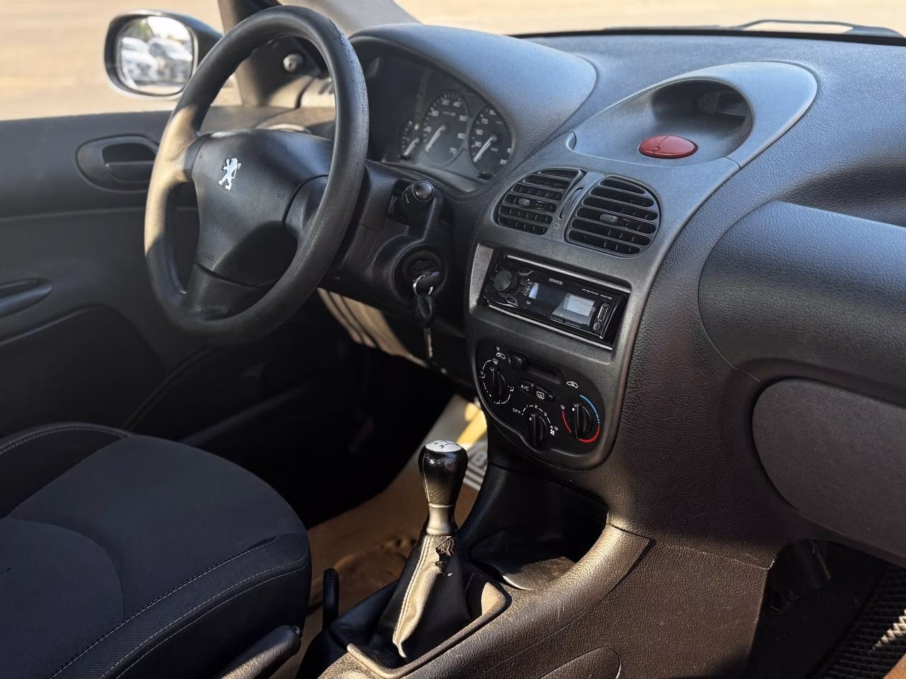 Peugeot 206 фото 8