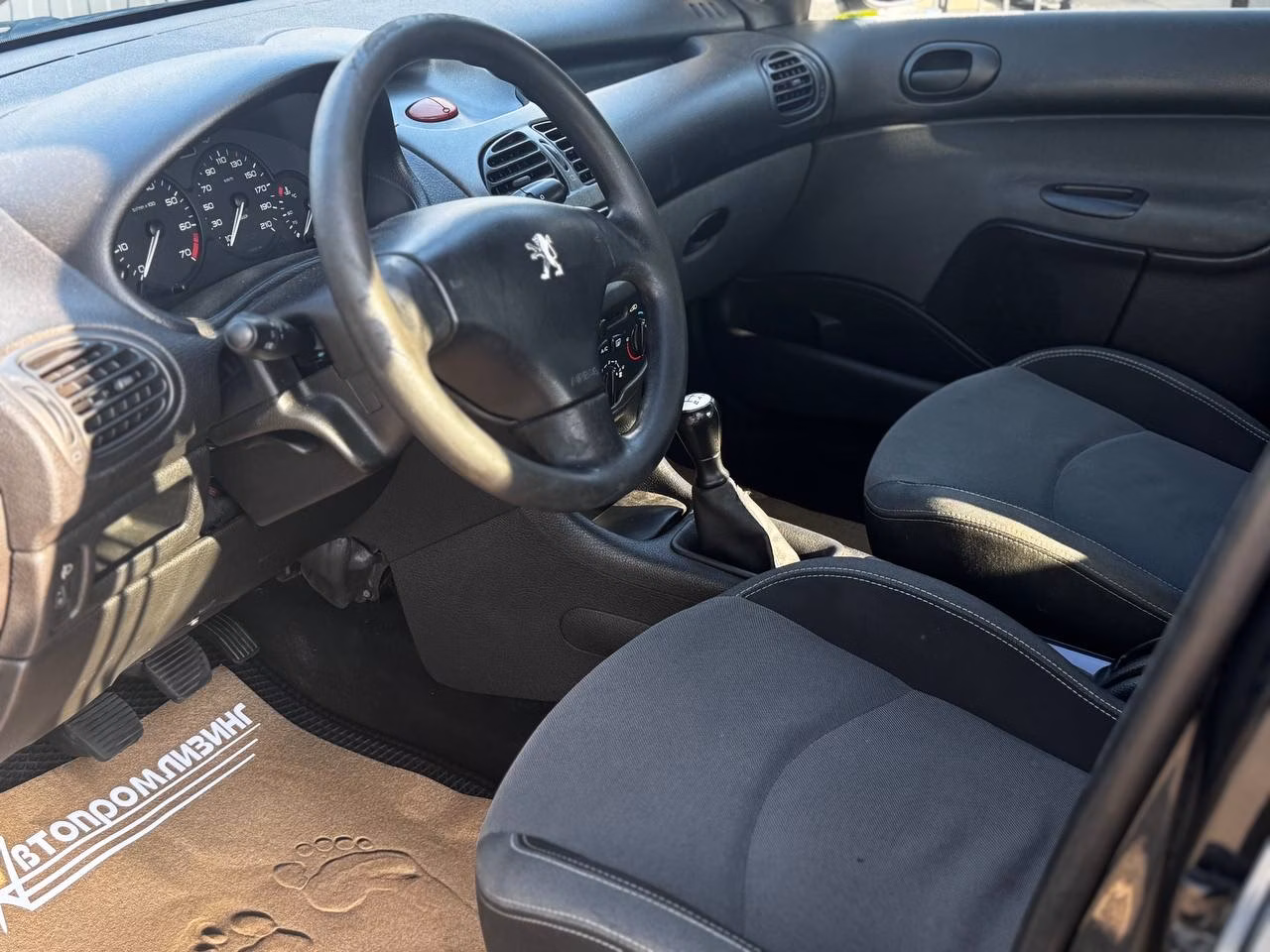Peugeot 206 фото 7