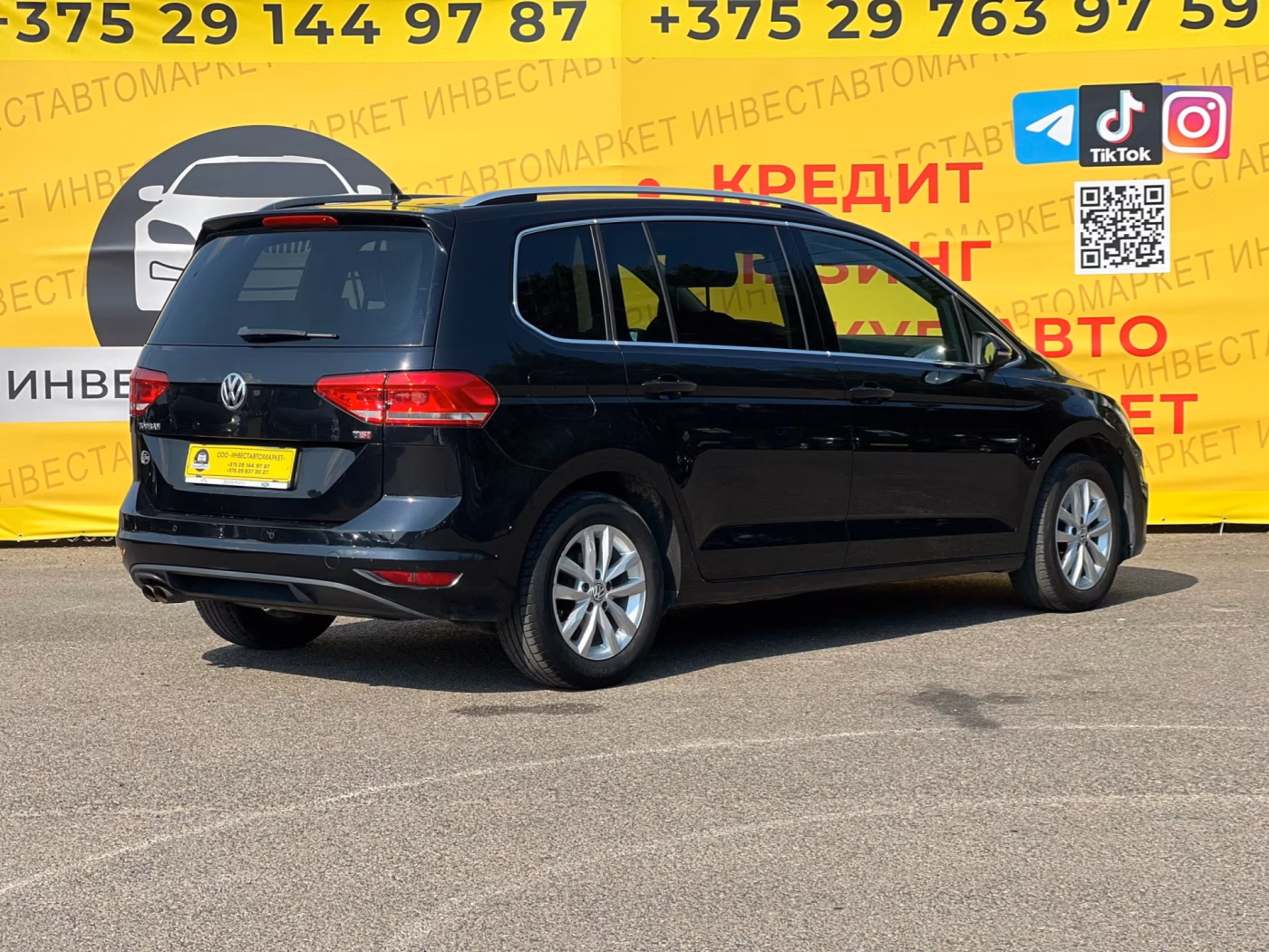 Volkswagen Touran фото 7