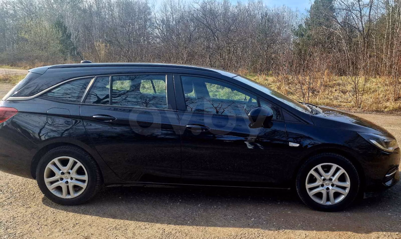 Opel Astra фото 5