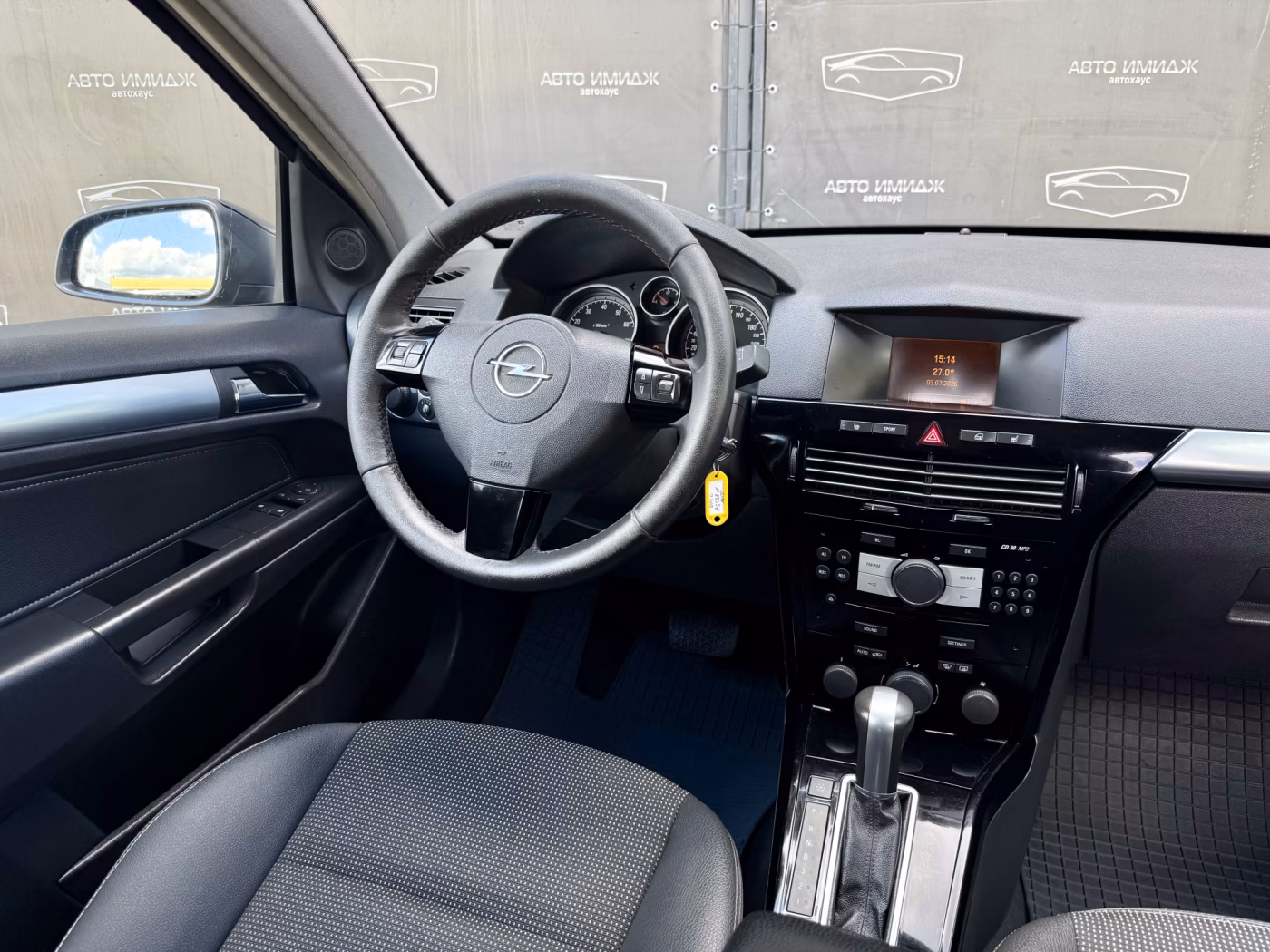 Opel Astra фото 13