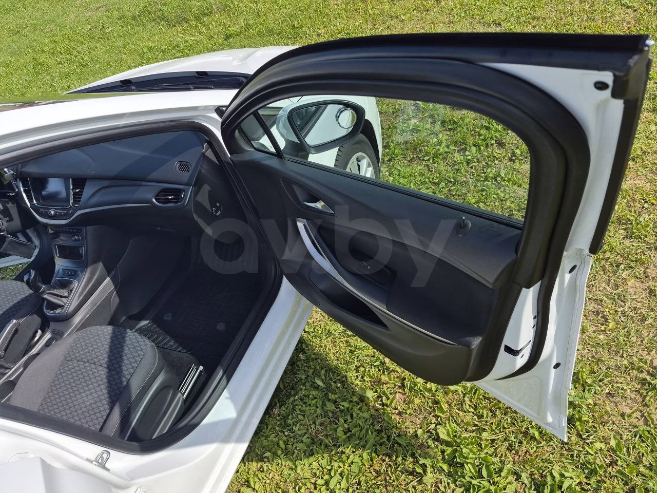Opel Astra фото 11