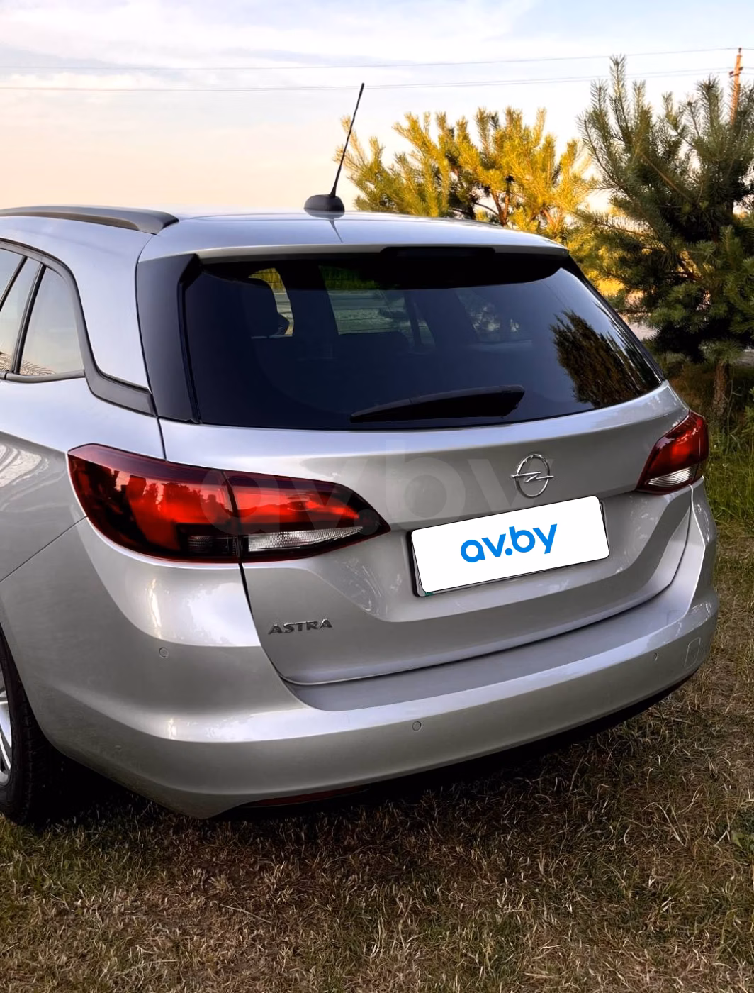 Opel Astra фото 11