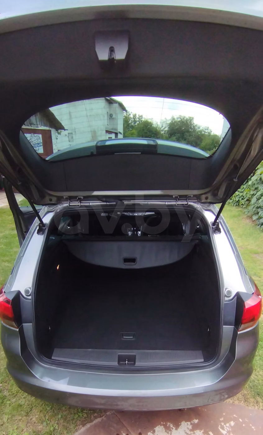 Opel Astra фото 10