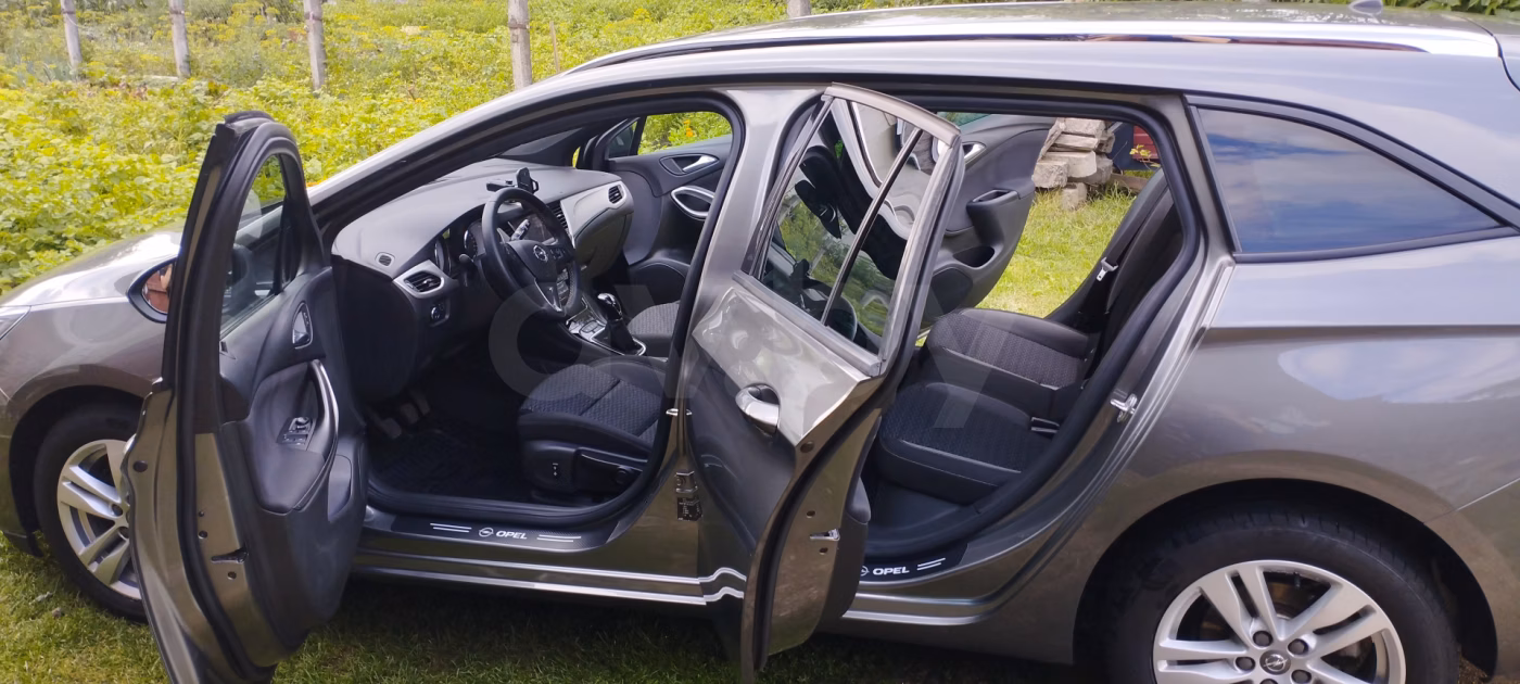 Opel Astra фото 6
