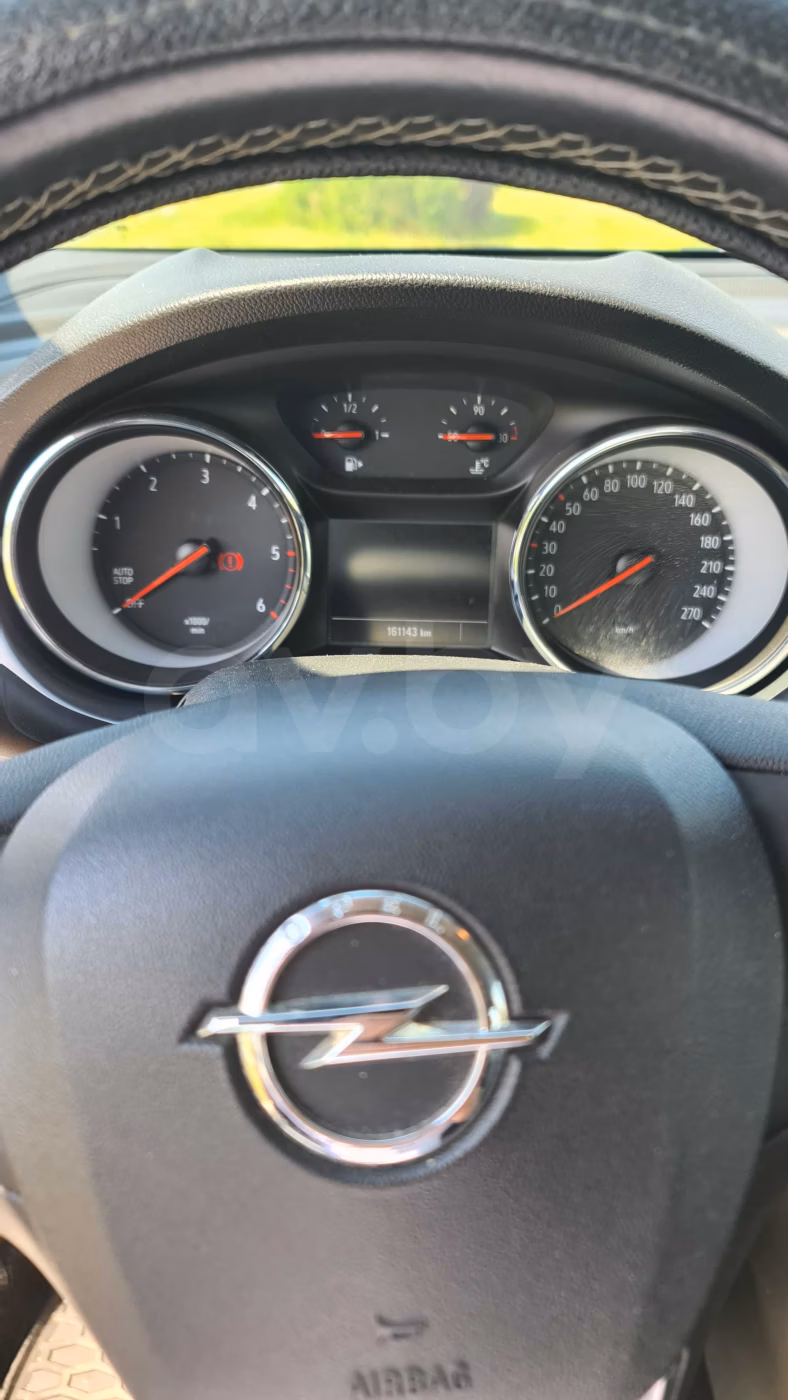 Opel Astra фото 7