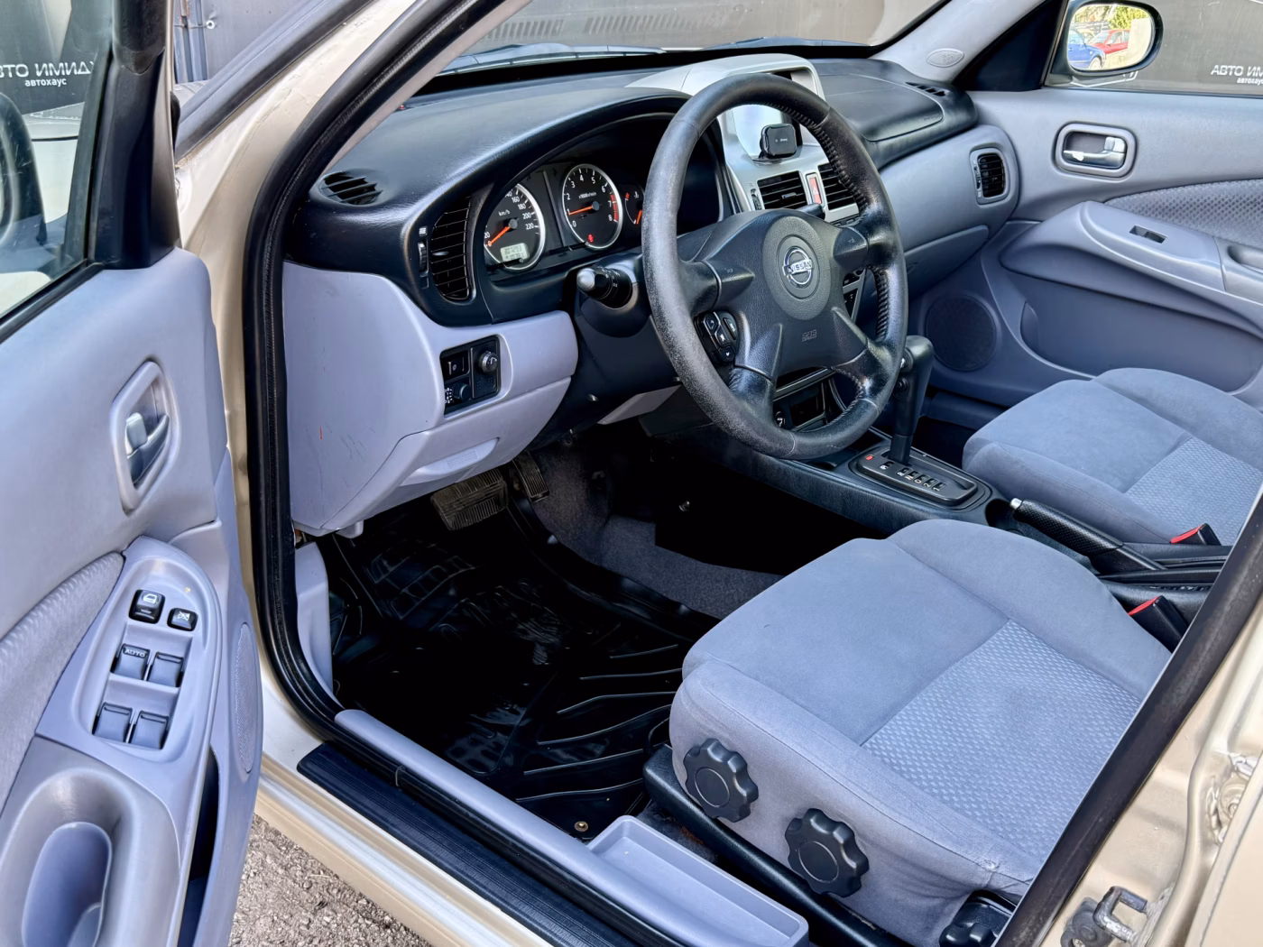 Nissan Almera фото 18