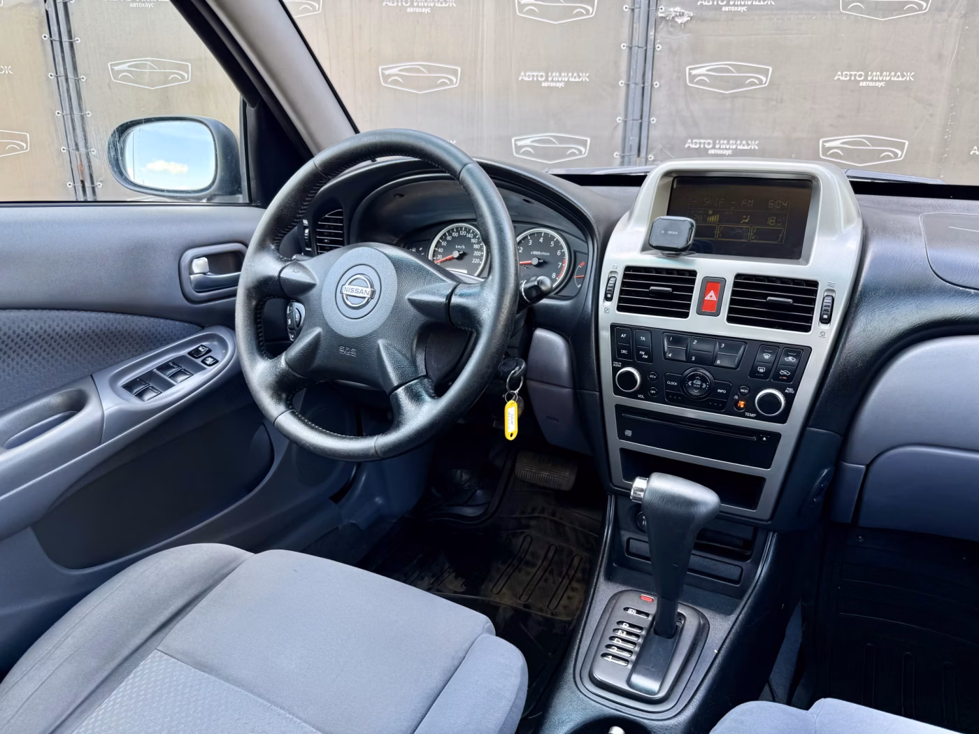 Nissan Almera фото 12