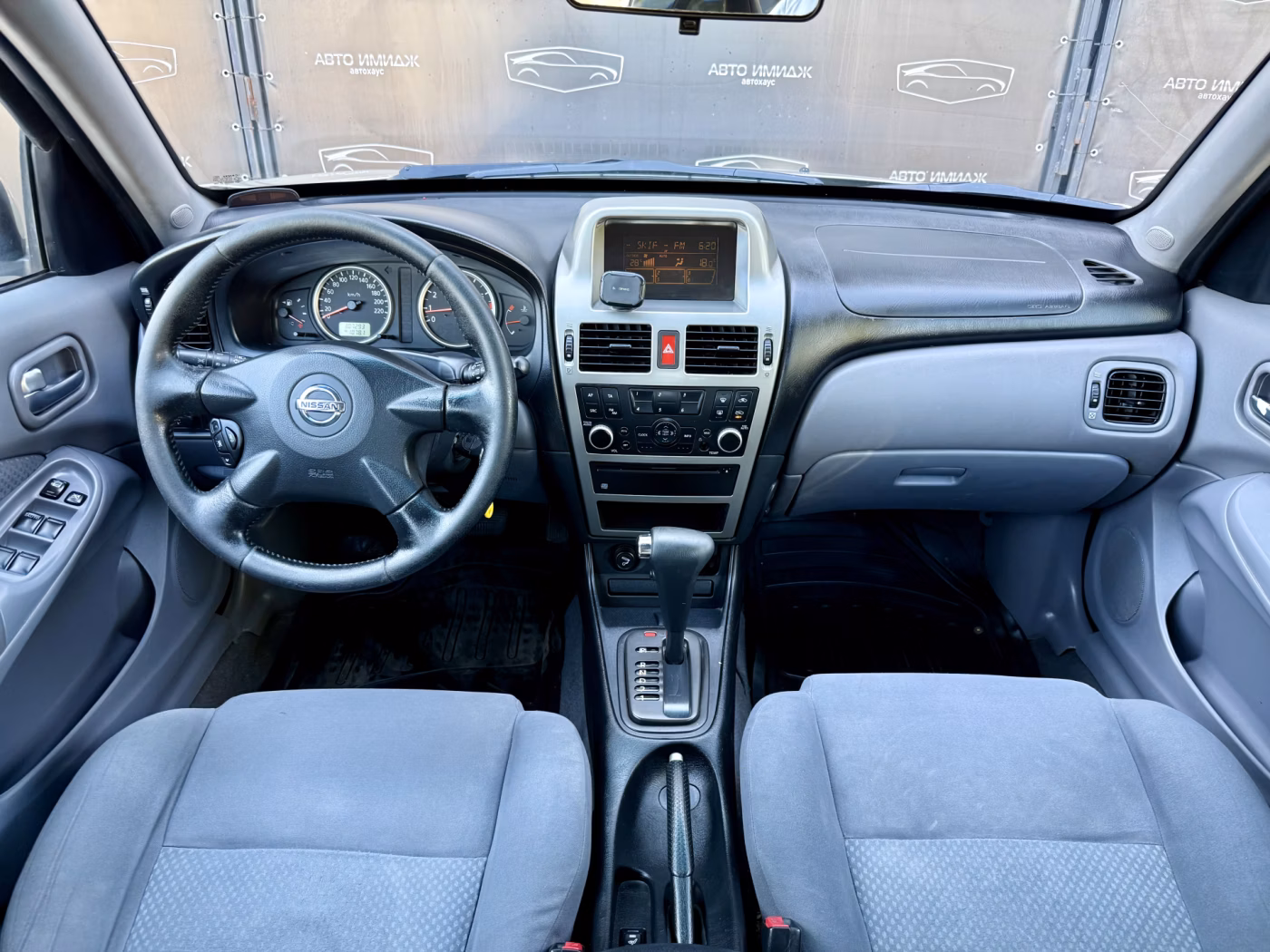 Nissan Almera фото 16