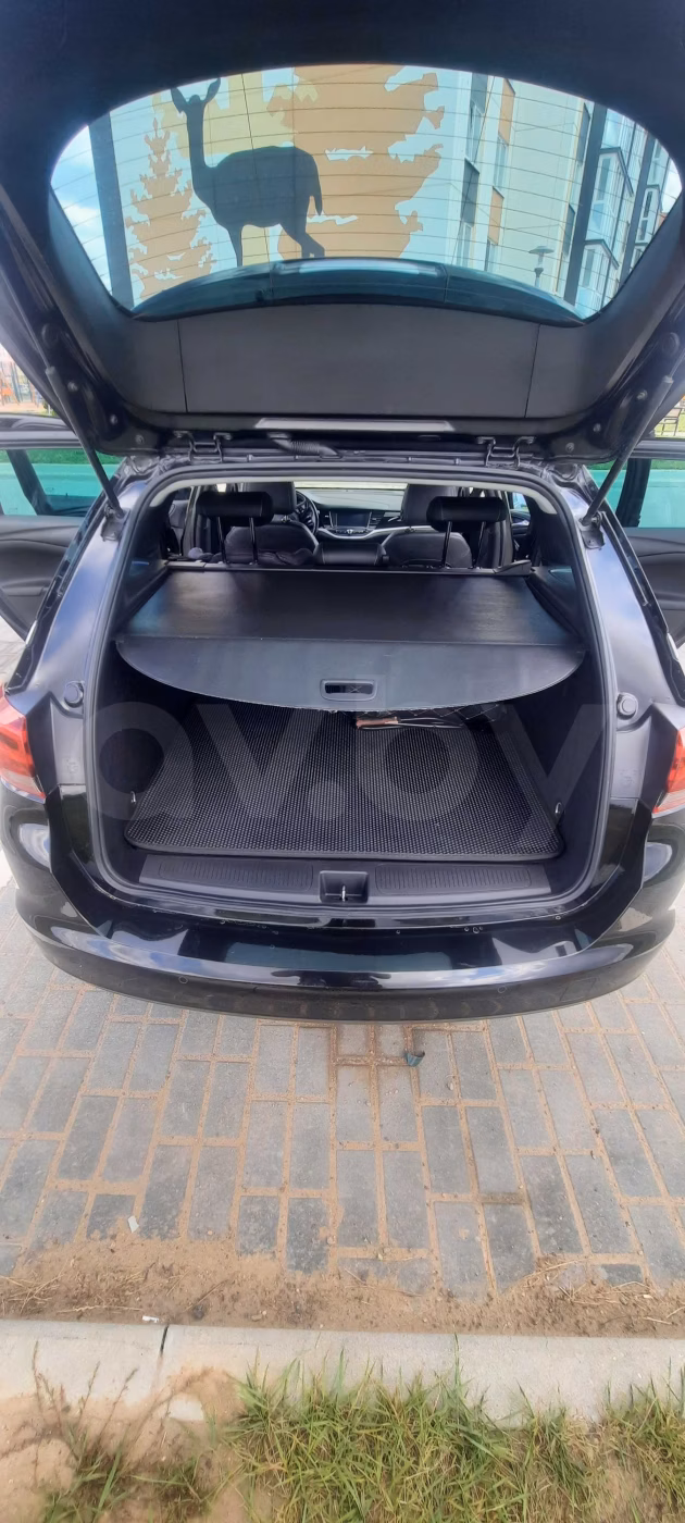 Opel Astra фото 9