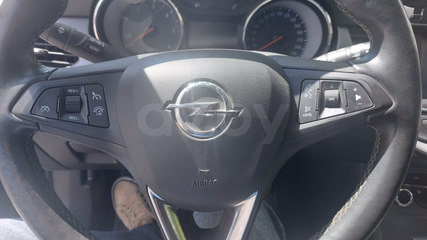Opel Astra фото 11